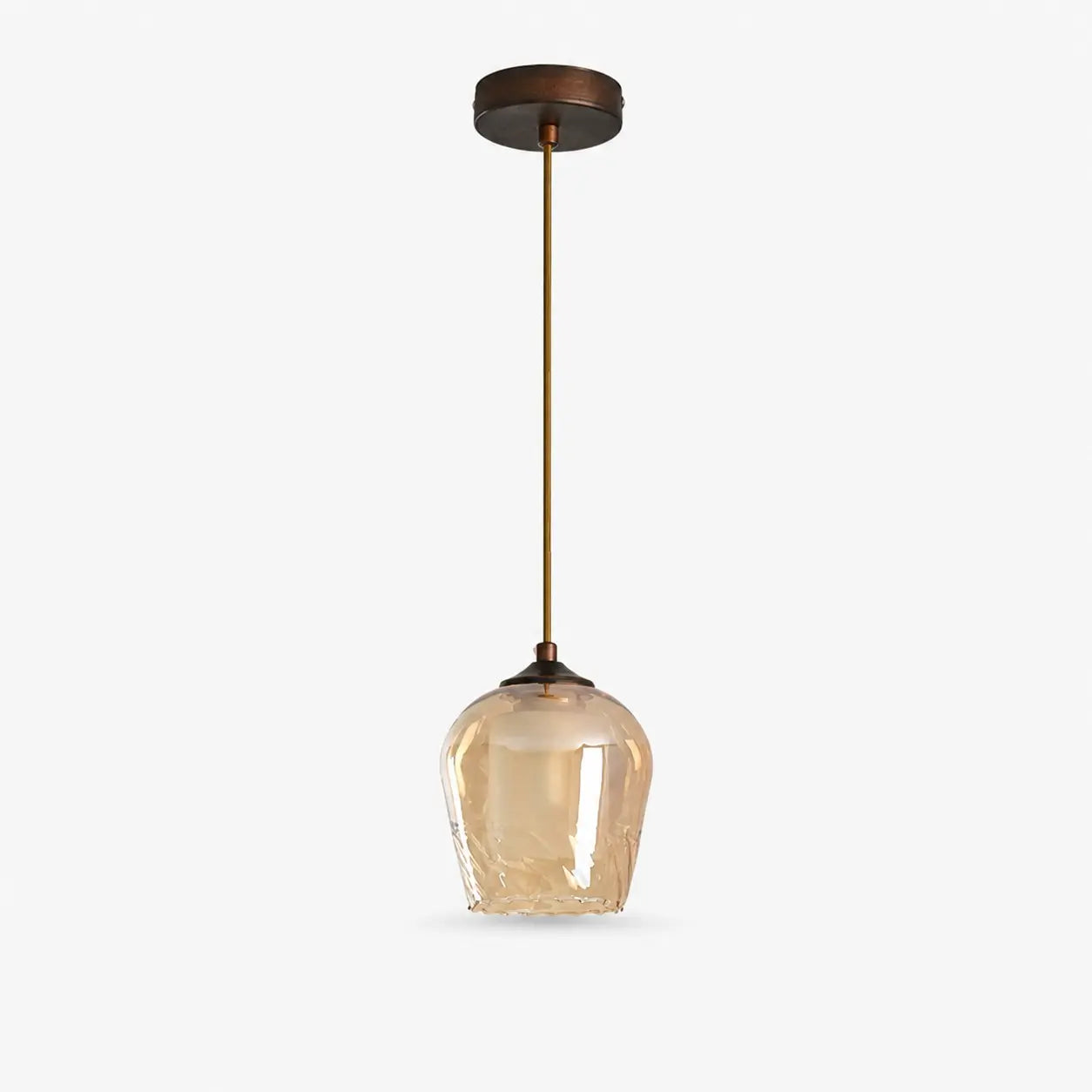 Amber glass pendant light with antique brass-tone fixture
