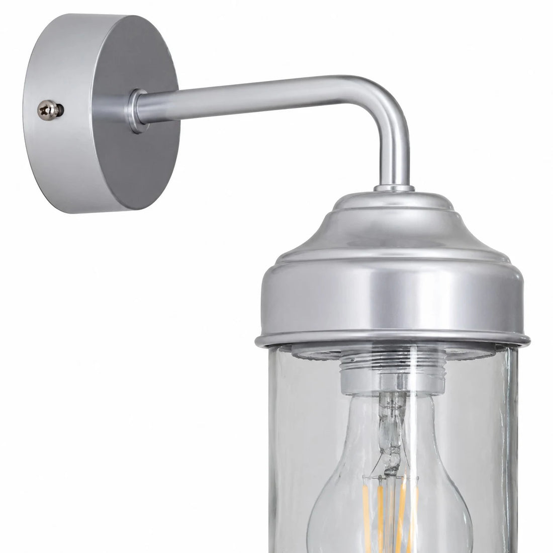 Close-up of aluminum canopy, arm and glass shade